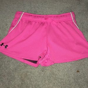 Pink under amour shorts. Size youth medium.